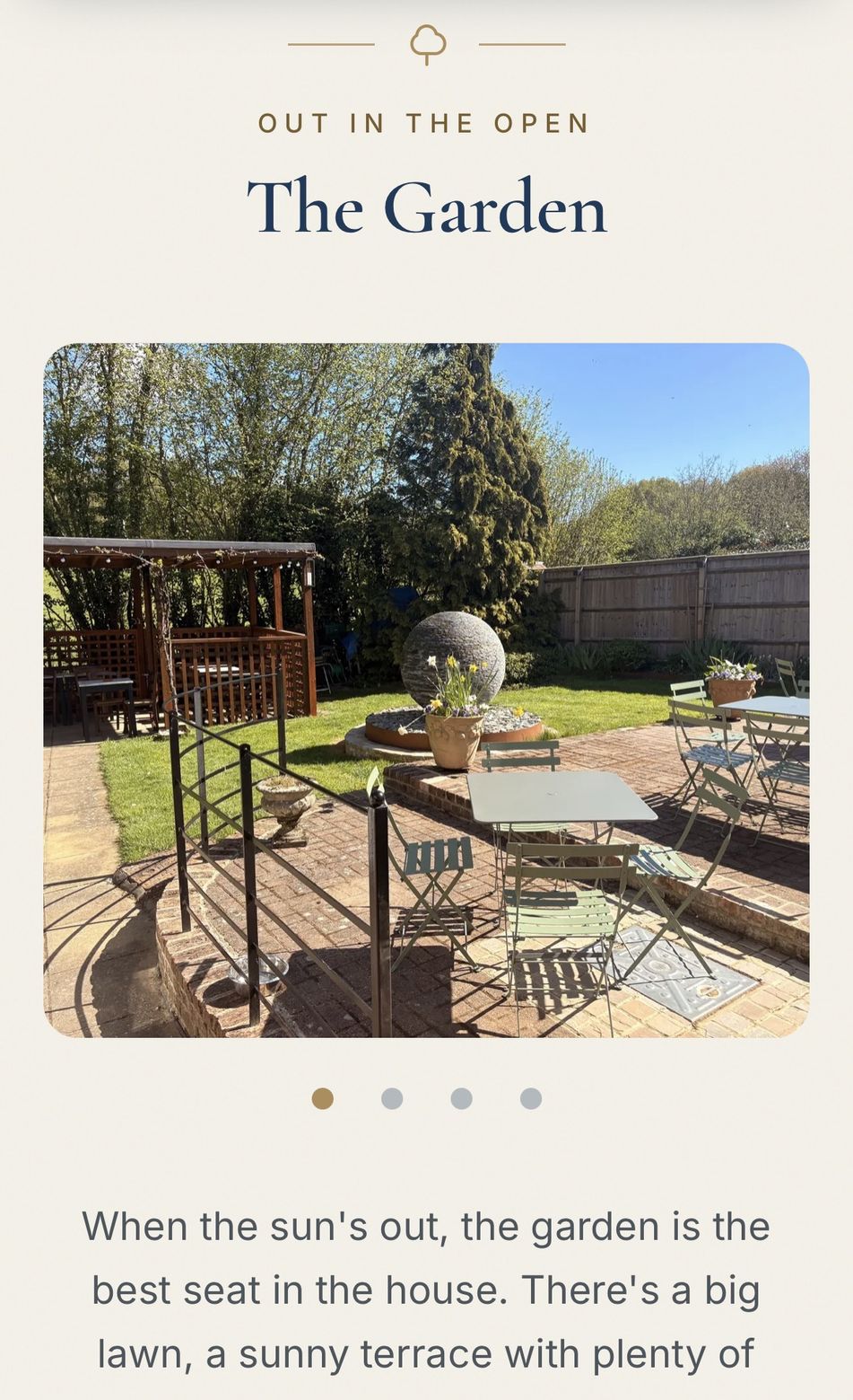 The garden section on a phone, with a photo of the sunny terrace, lawn and pergola